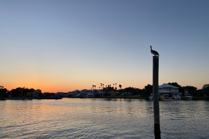 a sunset over a body of water